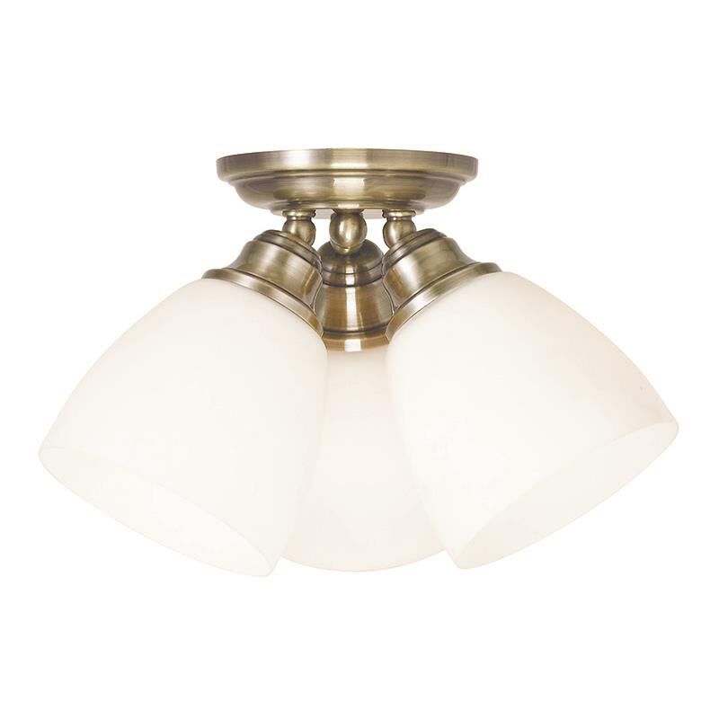 Shown in Antique Brass finish and Hand Blown Satin Opal White glass